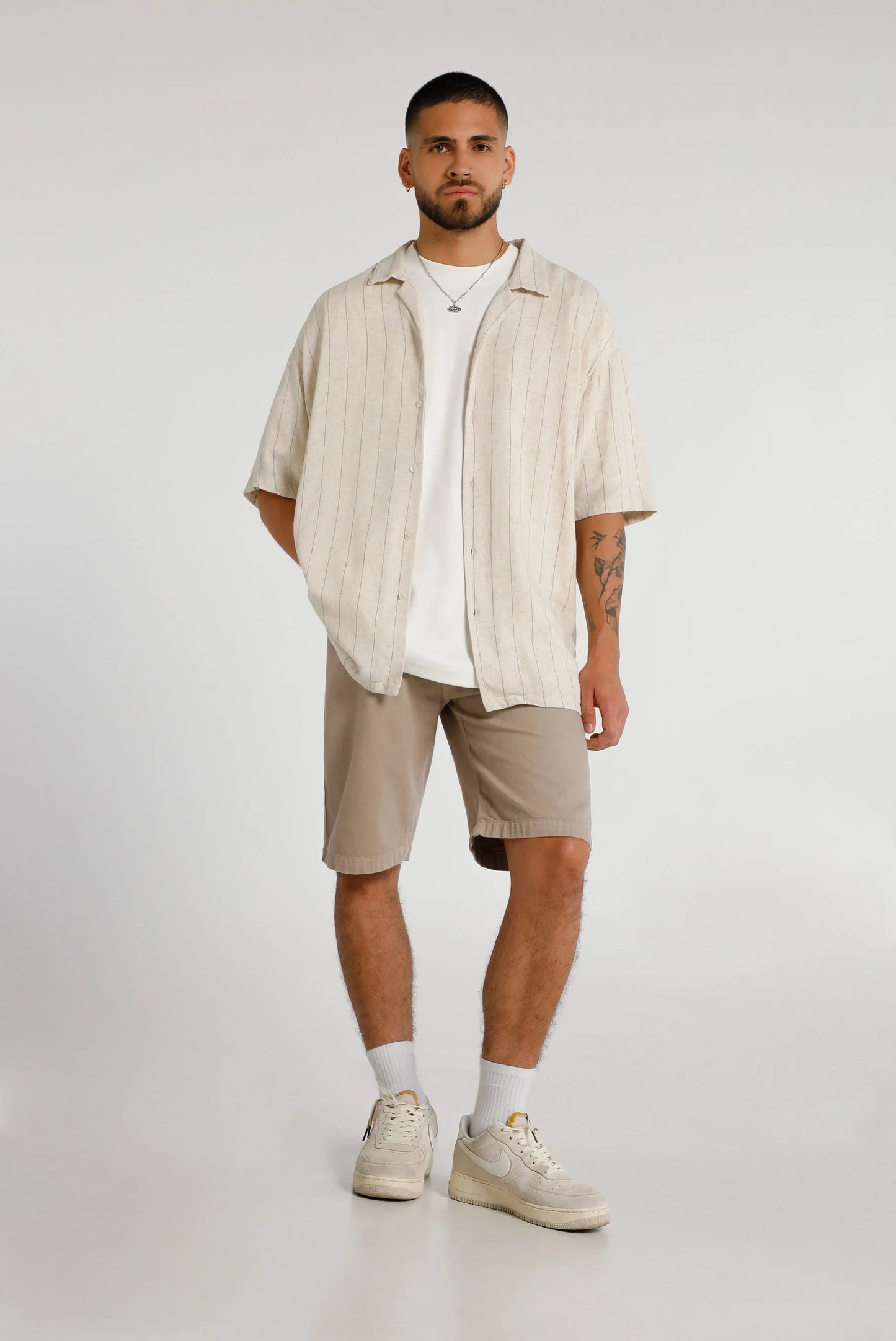 Camisa oversize beige rayas