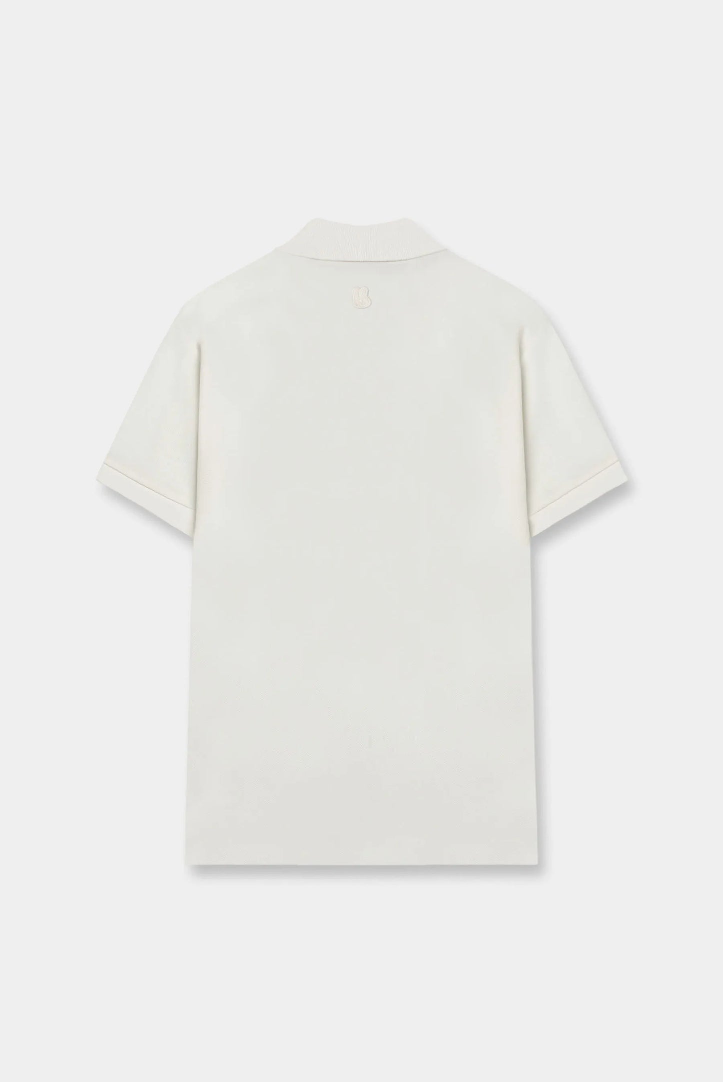 Camiseta polo color marfil