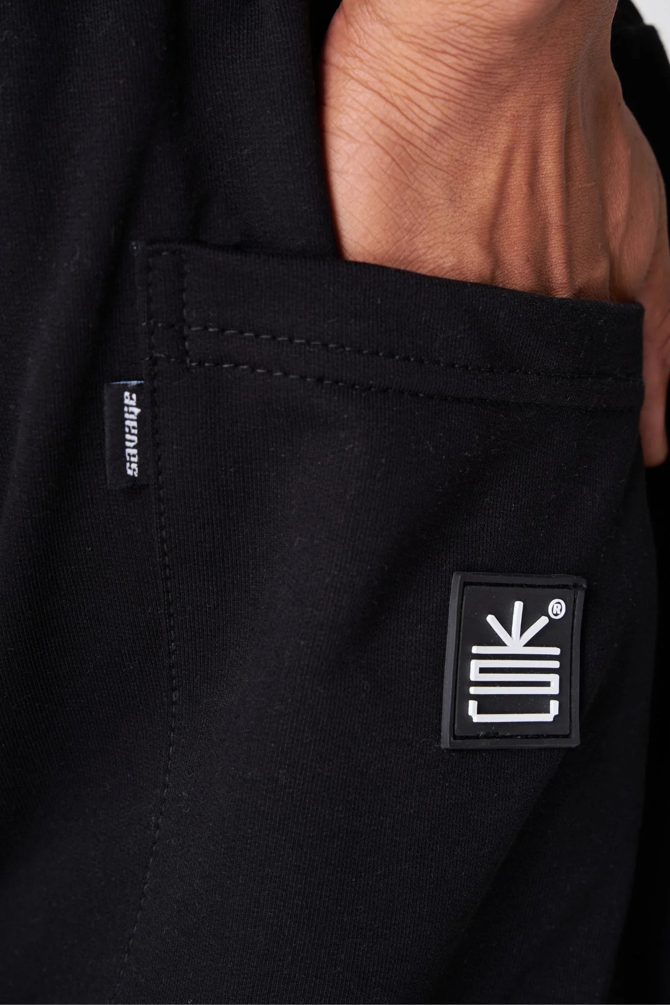 Pantalón Sweetpant French Negro logo en Goma