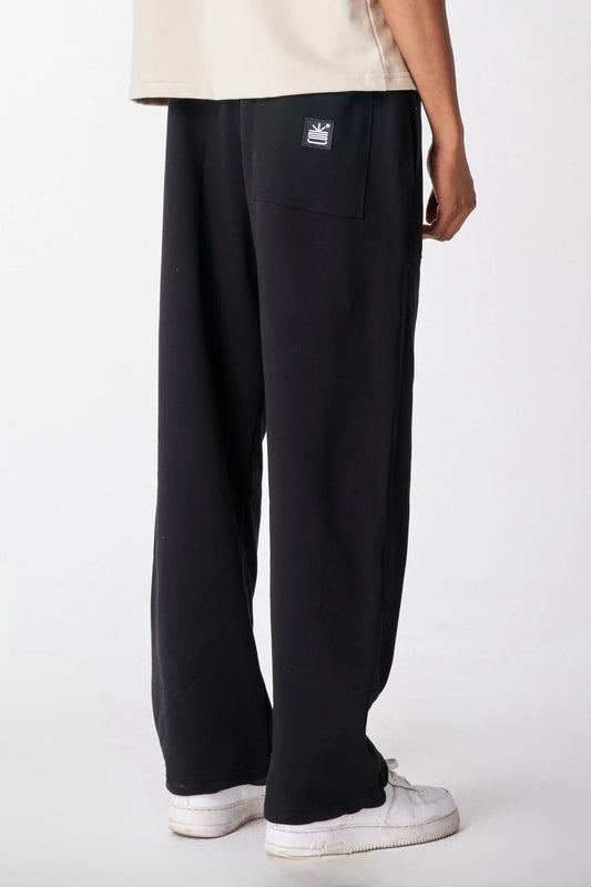 Pantalón Sweetpant French Negro logo en Goma