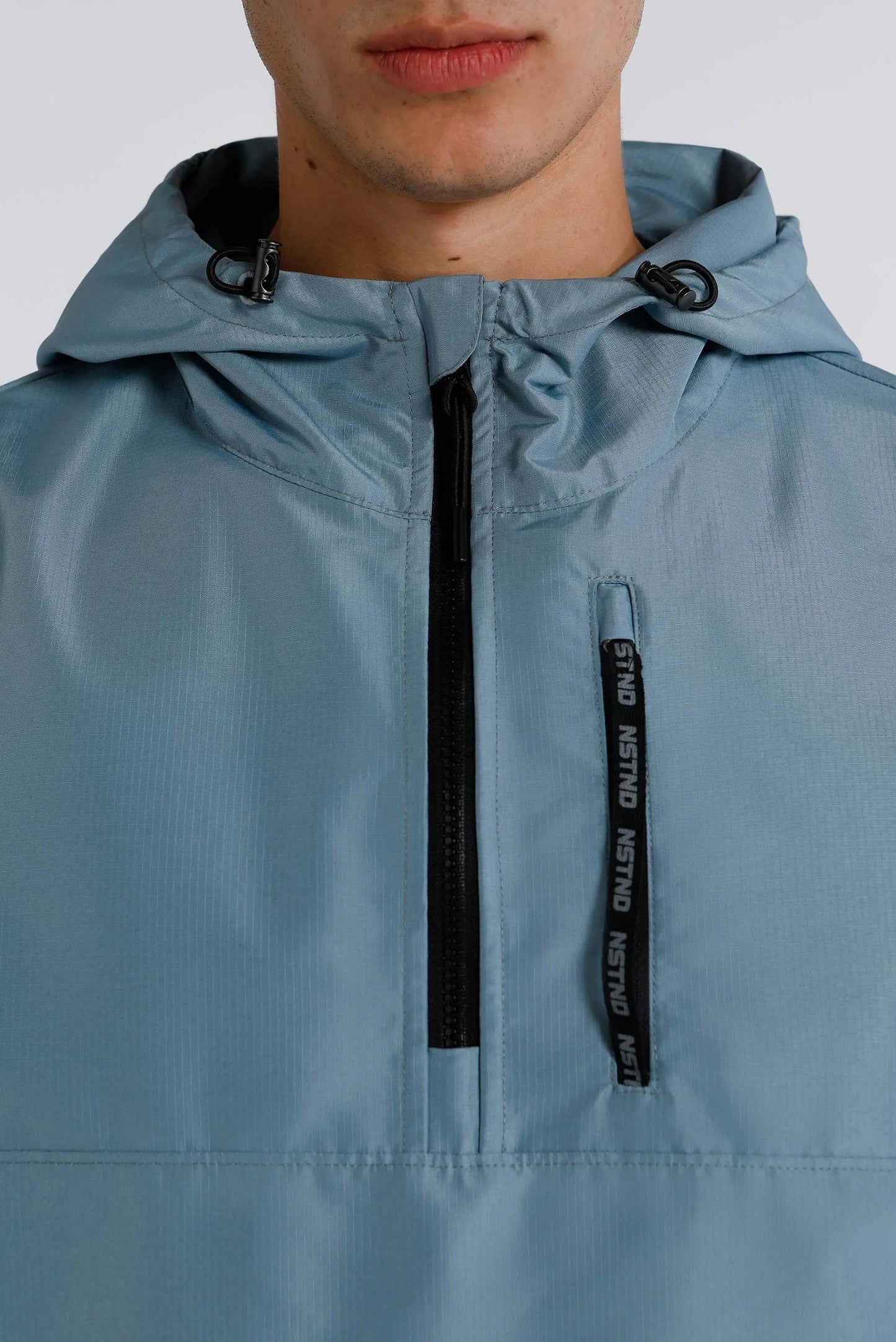 Chaqueta lisa celeste poliéster
